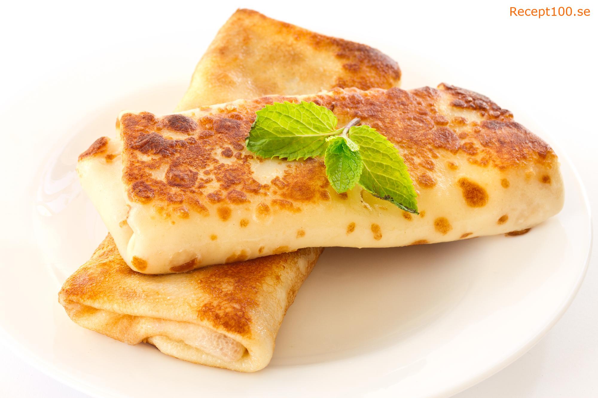 Pannkakor gratinerade med champinjoner och kyckling.